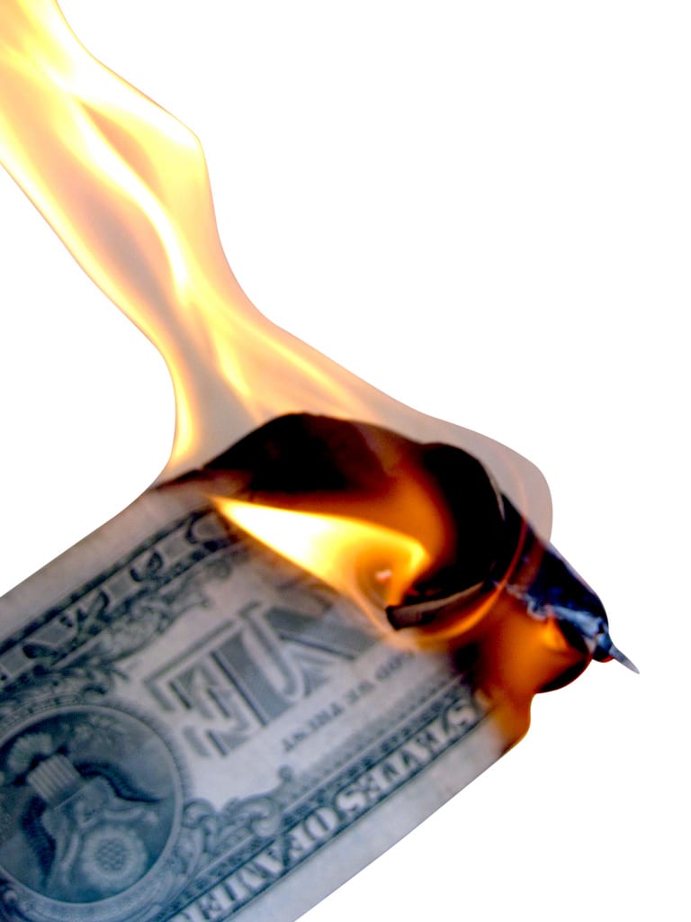[Burning $1 bill]